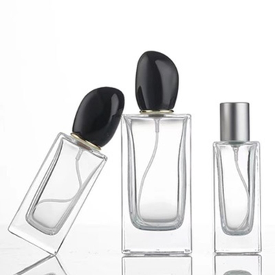 Bottiglia di profumo in vetro quadrato con 50 ml di 100 ml di capacità e tappo a forma irregolare