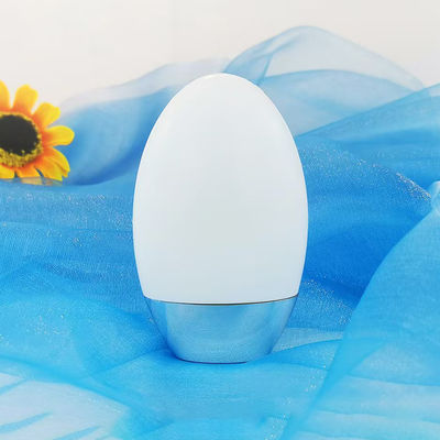 Flacone di crema solare personalizzato da 50 g a forma ovale con tappo argentato UV per packaging cosmetico in PP da 50 ml