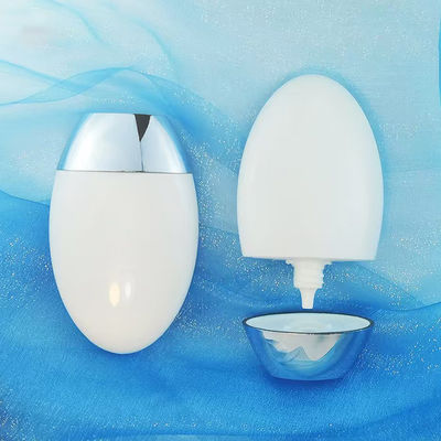 Flacone di crema solare personalizzato da 50 g a forma ovale con tappo argentato UV per packaging cosmetico in PP da 50 ml